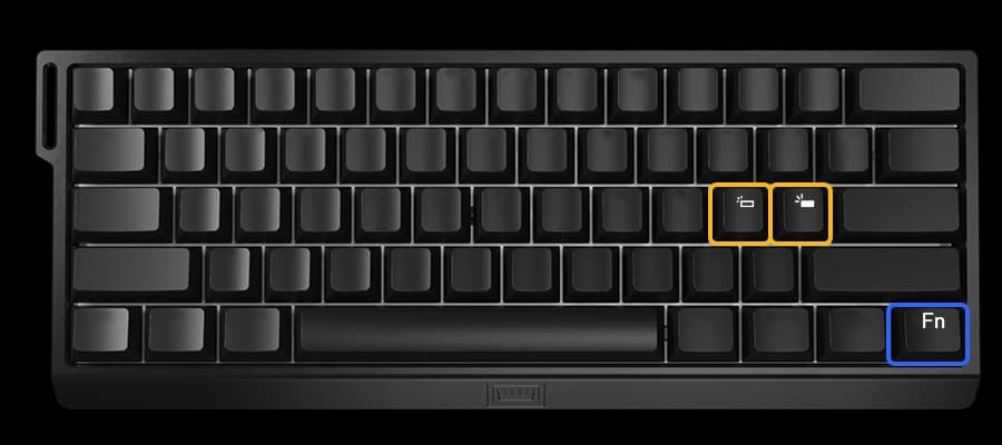Wooting 60HE+ showing the default positions of LED brightness keys