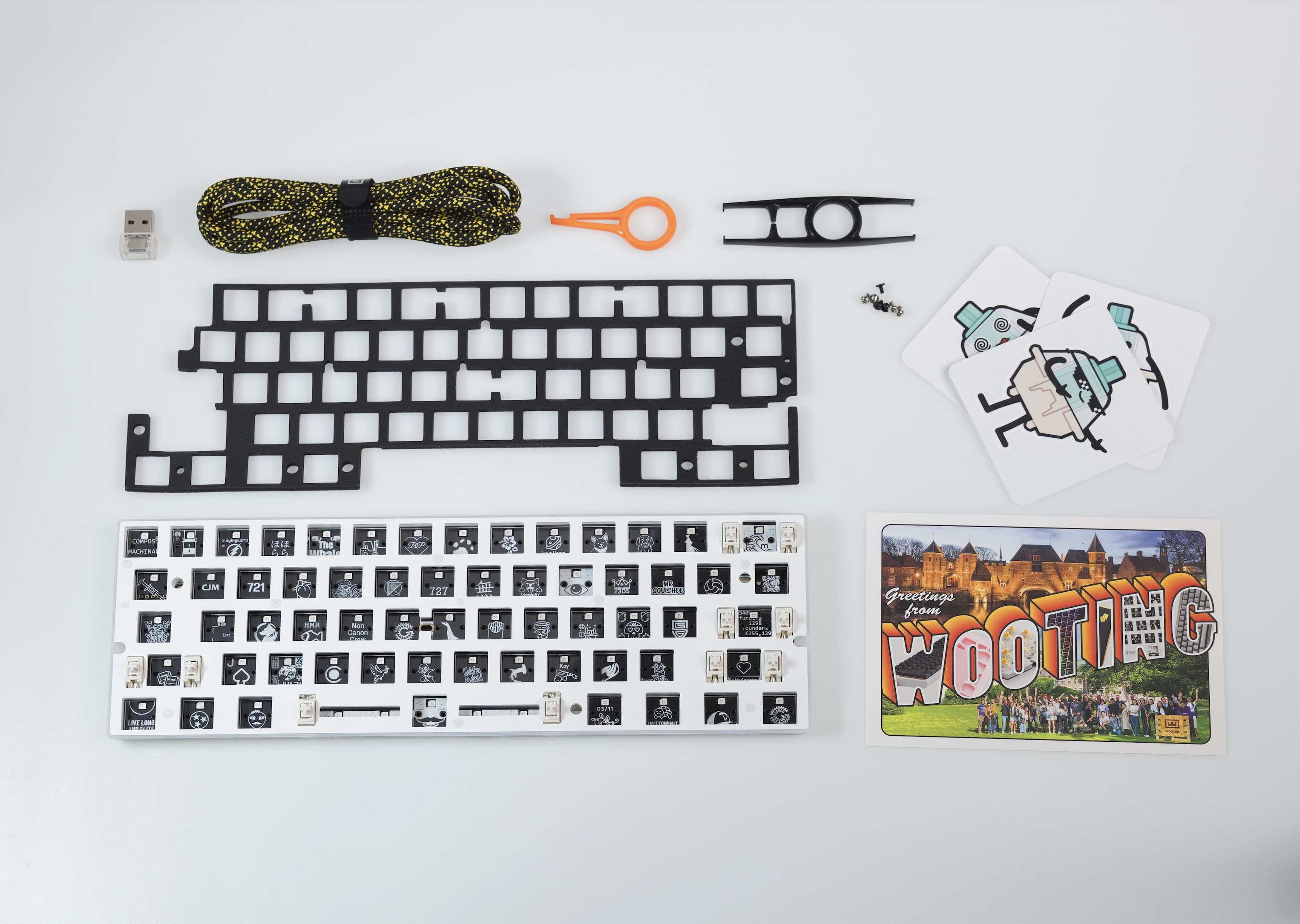 Wooting 60HE v2 Module with ANSI layout showing all items in the box