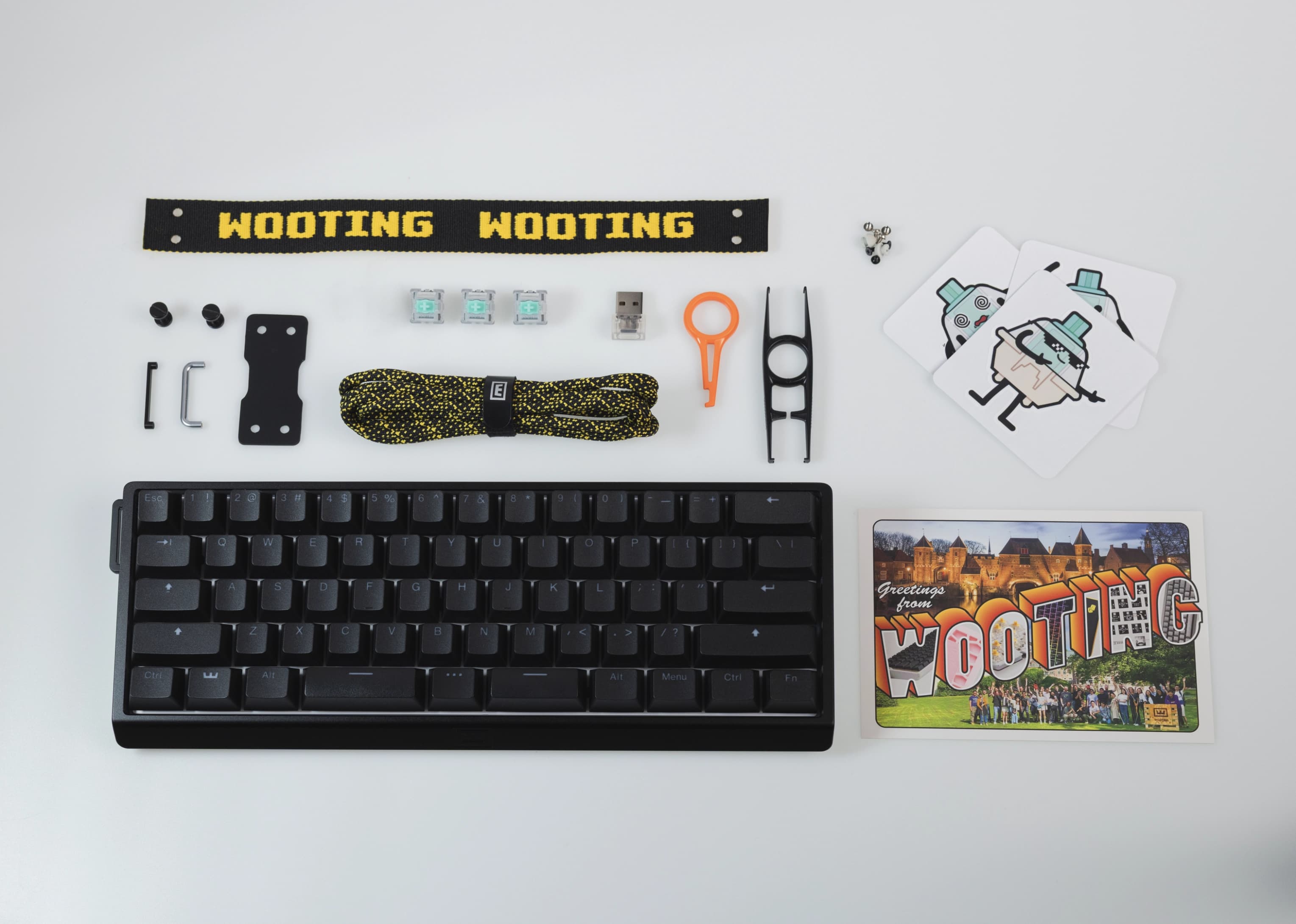 Wooting 60HE v2 with ANSI layout showing all items in the box