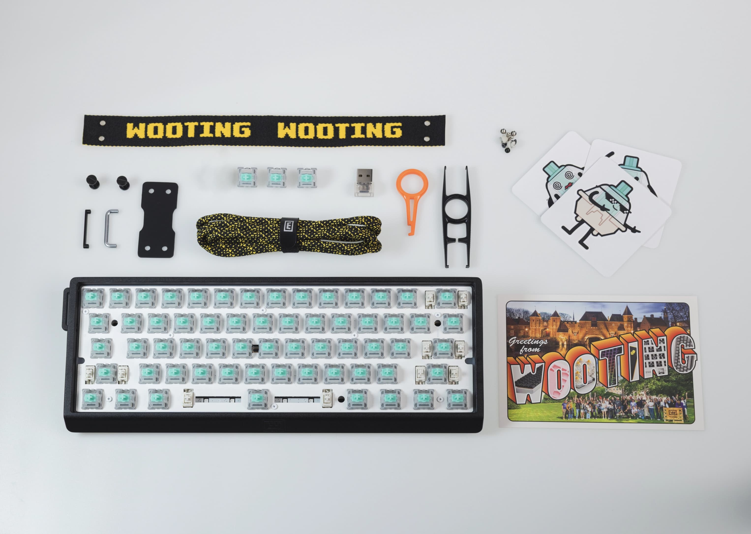 Wooting 60HE v2 with ISO layout showing all items in the box