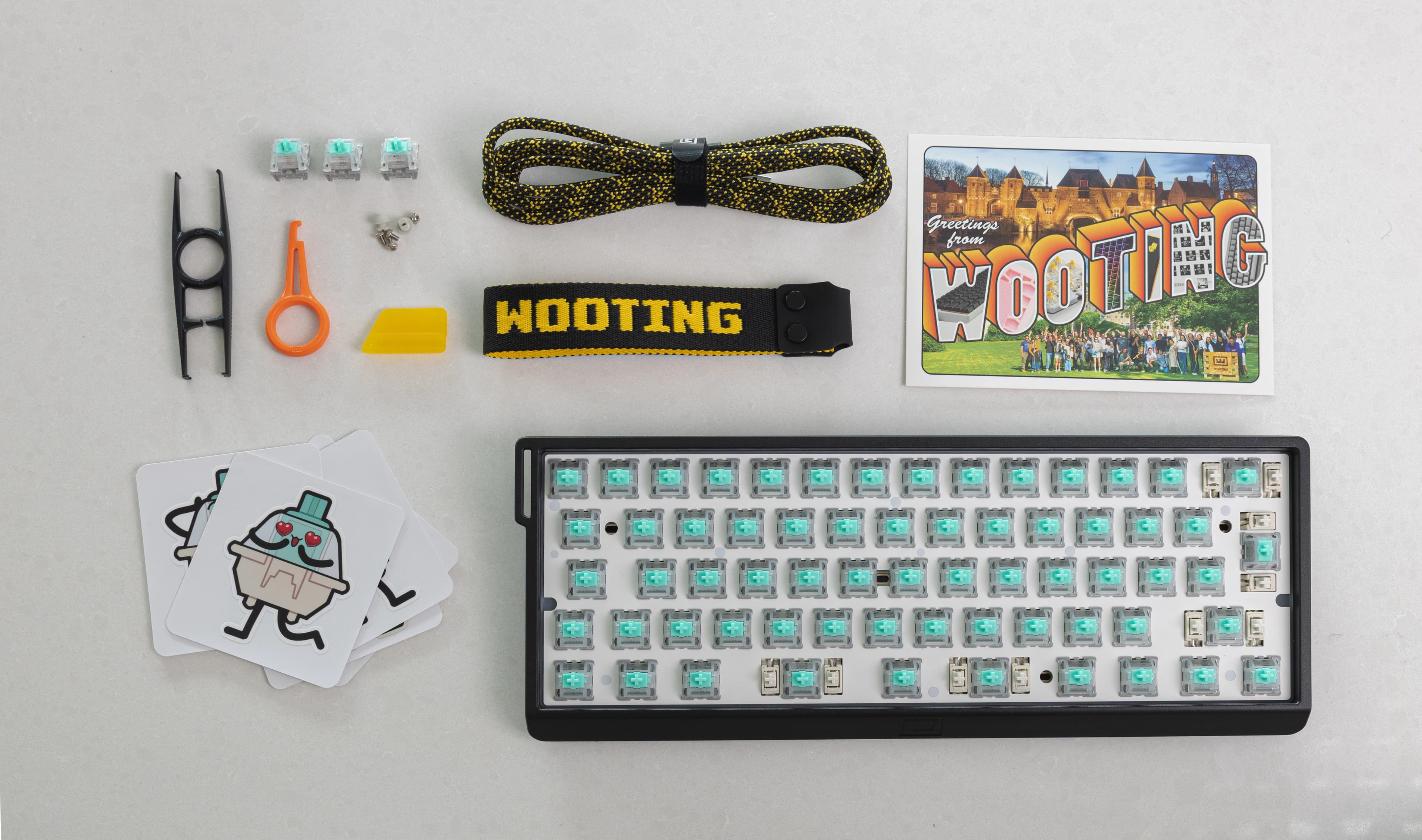 Wooting 60HE v2 with ISO layout showing all items in the box