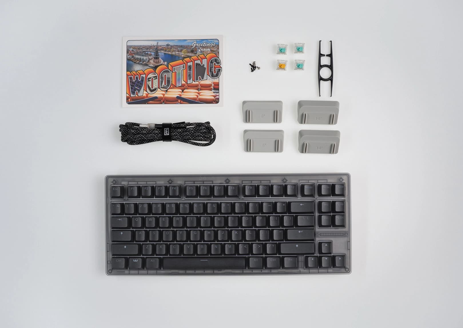 PCR ABS Wooting 80HE with ANSI layout showing all items in the box