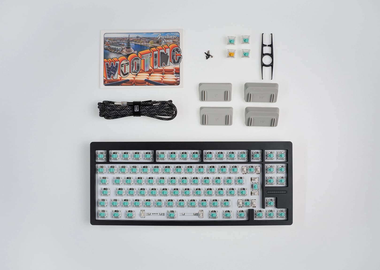 PCR ABS Wooting 80HE with ISO layout showing all items in the box