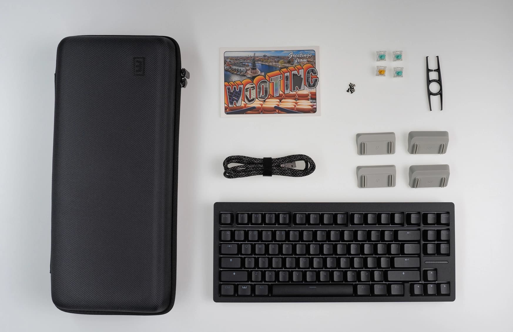 Zinc Alloy Wooting 80HE with ANSI layout showing all items in the box