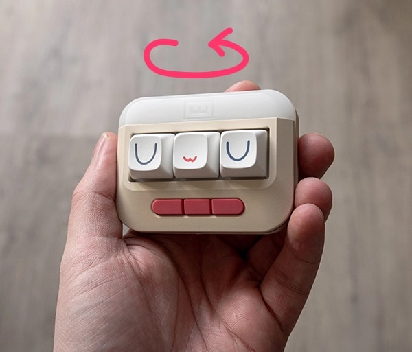 Wooting UwU showing the flip of the device