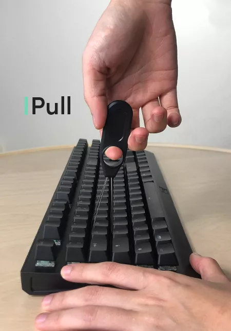 Wooting Two HE showing the pulling of a keycap with the keycap puller